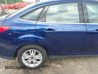 2012 Ford Focus SEL with VIN 1FAHP3H20CL135266, listed as a IAAI auction lot 42169559 with 196,104 mi miles. Bid and sale history available at carsss.com. Image 6.