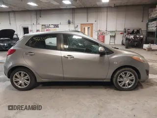 2012 Mazda 2 Sport with VIN JM1DE1KZ0C0149808, listed as a IAAI auction lot 42233078 with 166,111 mi miles and . Bid and sale history available at DreamBid. Image 14.