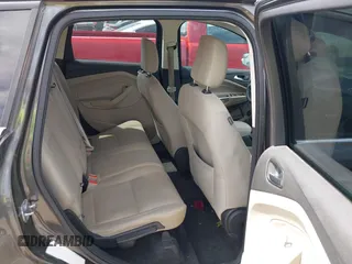 2018 Ford Escape SE z VIN 1FMCU9G98JUC13620, wystawiony jako IAAI lot #42011272 z przebiegiem 71 677 mil mil oraz . Historia ofert i sprzedaży dostępna na DreamBid. Obrazek 8.