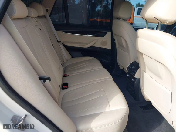 2016 BMW X5 xDrive35i with VIN 5UXKR0C54G0P27141, listed as a IAAI auction lot 41553602 with 61,947 mi miles. Bid and sale history available at carsss.com. Image 8.