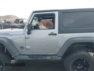 2013 Jeep Wrangler Rubicon 10th Anniversary with VIN 1C4BJWCG8DL639121, listed as a IAAI auction lot 40561773 with 56,023 mi miles and . Bid and sale history available at DreamBid. Image 14.
