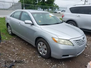 2007 Toyota Camry CE z VIN 4T1BE46K77U666118, wystawiony jako IAAI lot #42481230 z przebiegiem 297 662 mil mil oraz . Historia ofert i sprzedaży dostępna na DreamBid. Obrazek 1.