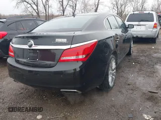 2014 Buick LaCrosse Premium II with VIN 1G4GF5G39EF305104, listed as a IAAI auction lot 41715121 with 81,341 mi miles and . Bid and sale history available at DreamBid. Image 4.
