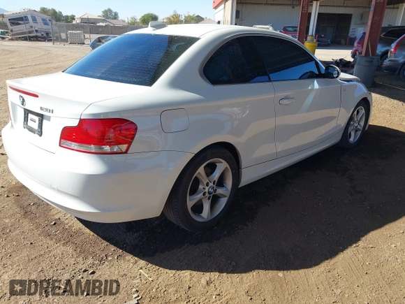 2009 BMW 1 Series 128i with VIN WBAUP73549VK74523, listed as a IAAI auction lot 41337097 with 108,608 mi miles and . Bid and sale history available at carsss.com. Image 4.