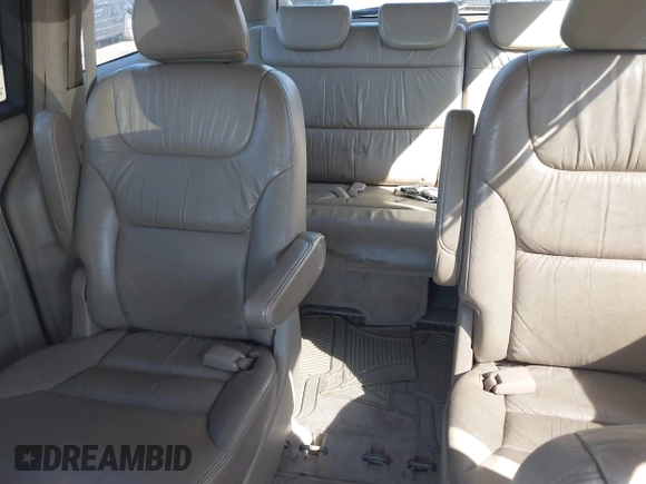 2006 Honda Odyssey EX-L z VIN 5FNRL38736B069969, wystawiony jako IAAI lot #41695311 z przebiegiem 196 218 mil mil oraz . Historia ofert i sprzedaży dostępna na DreamBid. Obrazek 8.
