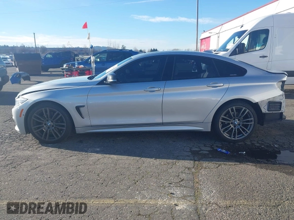 2015 BMW 4 Series 428i with VIN WBA4A5C58FG051293, listed as a IAAI auction lot 41255541 with 60,737 mi miles and . Bid and sale history available at DreamBid. Image 15.