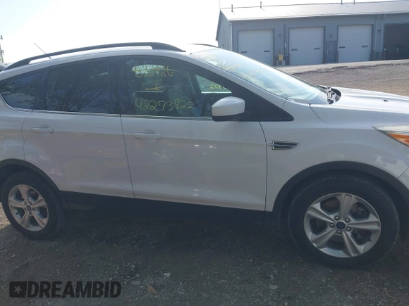 2014 Ford Escape SE with VIN 1FMCU9G92EUB32926, listed as a IAAI auction lot 42273922 with 172,193 mi miles and . Bid and sale history available at DreamBid. Image 13.