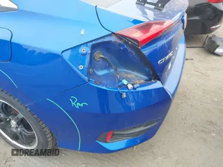 2017 Honda Civic LX with VIN 19XFC2F53HE217867, listed as a IAAI auction lot 42296194 with 104,670 mi miles and . Bid and sale history available at DreamBid. Image 18.