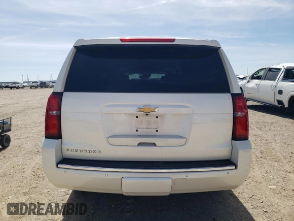 2015 Chevrolet Suburban LTZ with VIN 1GNSKKKC1FR659707, listed as a Copart auction lot 50202895 with 91,680 mi miles and Salvage Title. Bid and sale history available at DreamBid. Image 6.