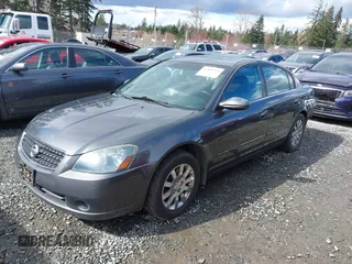 2006 Nissan Altima 2.5 with VIN 1N4AL11D06N304367, listed as a IAAI auction lot 41808294 with 198,815 mi miles. Bid and sale history available at carsss.com. Image 18.