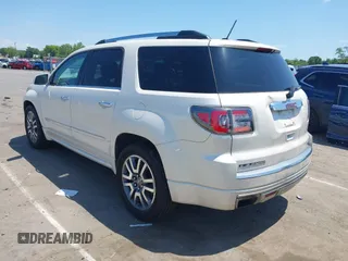 2014 GMC Acadia Denali with VIN 1GKKVTKD1EJ220183, listed as a IAAI auction lot 42230611 with 103,789 mi miles and . Bid and sale history available at carsss.com. Image 3.