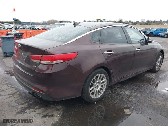2016 Kia Optima EX with VIN 5XXGU4L31GG004714, listed as a IAAI auction lot 41183230 with 108,084 mi miles. Bid and sale history available at carsss.com. Image 4.