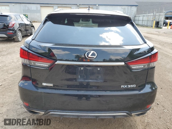 2021 Lexus RX 350 F Sport with VIN 2T2YZMDAXMC297790, listed as a Copart auction lot 63022735 with 76,819 mi miles and Clean title. Bid and sale history available at DreamBid. Image 6.