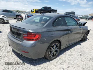 2015 BMW 2 Series M235i with VIN WBA1J7C55FV253647, listed as a Copart auction lot 60231395 with 57,639 mi miles and Salvage title. Bid and sale history available at DreamBid. Image 3.