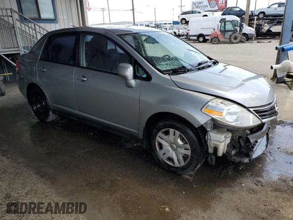 2011 Nissan Versa S with VIN 3N1BC1AP3BL404551, listed as a Copart auction lot 51977085 with 207,070 mi miles and Salvage title. Bid and sale history available at DreamBid. Image 4.