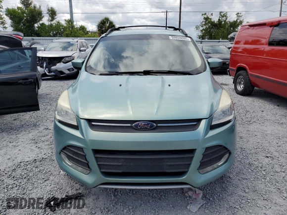 2013 Ford Escape SE z VIN 1FMCU0GX9DUD66067, wystawiony jako Copart lot #59859095 z przebiegiem 132 820 mil mil oraz Czysty tytuł • Clean title. Historia ofert i sprzedaży dostępna na DreamBid. Obrazek 5.
