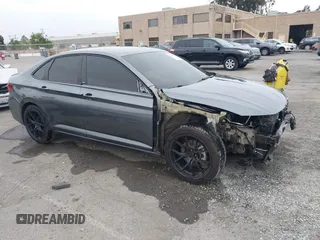 2023 Volkswagen Jetta Sport with VIN 3VWBM7BU0PM031436, listed as a IAAI auction lot 42120931 with 64,586 mi miles and . Bid and sale history available at DreamBid. Image 1.