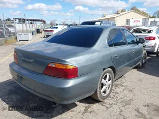 1999 Acura TL with VIN 19UUA565XXA036119, listed as a IAAI auction lot 41830729 with 203,538 mi miles. Bid and sale history available at carsss.com. Image 4.