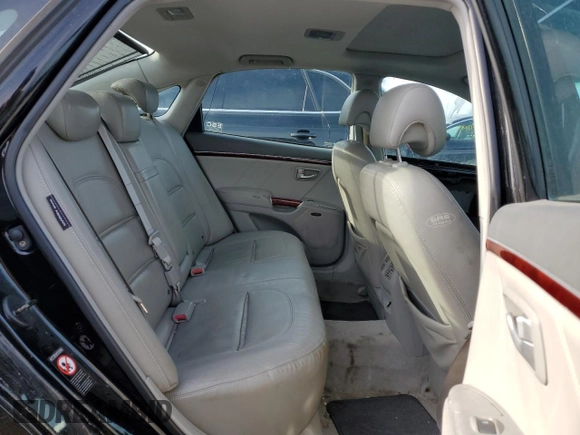 2007 Hyundai Azera SE z VIN KMHFC46F17A154947, wystawiony jako Copart lot #49224835 z przebiegiem 211 940 mil mil oraz Szkoda całkowita • Salvage title. Historia ofert i sprzedaży dostępna na DreamBid. Obrazek 10.
