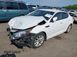 2014 Kia Optima LX with VIN KNAGM4A76E5454542, listed as a IAAI auction lot 42006510 with 192,291 mi miles and . Bid and sale history available at carsss.com. Image 2.
