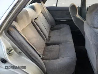 1990 Nissan Stanza GXE z VIN JN1FU21P9LX822087, wystawiony jako Copart lot #82967984 z przebiegiem 109 985 mil mil oraz Tytuł czysty. Historia ofert i sprzedaży dostępna na DreamBid. Obrazek 10.