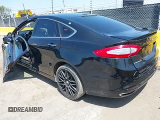 2016 Ford Fusion Titanium with VIN 3FA6P0K9XGR390364, listed as a IAAI auction lot 42165029 with 188,693 mi miles and . Bid and sale history available at DreamBid. Image 3.