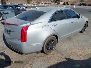 2013 Cadillac ATS z VIN 1G6AA5RA2D0120840, wystawiony jako IAAI lot #41276871 z przebiegiem 179 999 mil mil oraz . Historia ofert i sprzedaży dostępna na DreamBid. Obrazek 4.