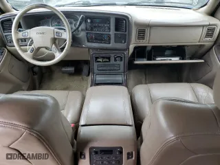 2004 GMC Yukon Denali with VIN 1GKEK63U64J132587, listed as a Copart auction lot 76592404 with 252,569 mi miles and Clean Title. Bid and sale history available at carsss.com. Image 8.