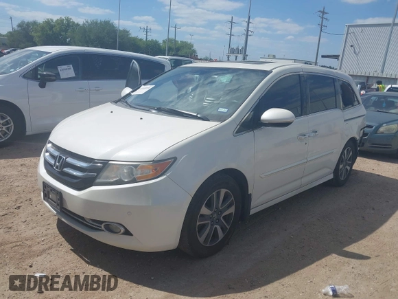 2016 Honda Odyssey Touring Elite with VIN 5FNRL5H98GB102544, listed as a IAAI auction lot 42040050 with 128,957 mi miles and . Bid and sale history available at DreamBid. Image 21.