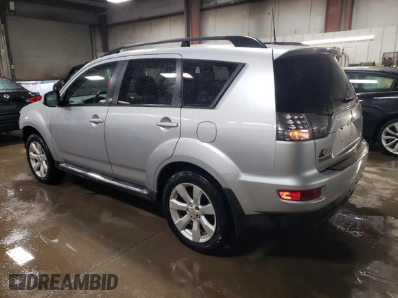2010 Mitsubishi Outlander XLS z VIN JA4JT4AX9AZ002688, wystawiony jako Copart lot #51173605 z przebiegiem 162 147 mil mil oraz Szkoda całkowita • Salvage title. Historia ofert i sprzedaży dostępna na DreamBid. Obrazek 2.