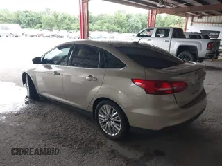 2017 Ford Focus Titanium with VIN 1FADP3J26HL279839, listed as a IAAI auction lot 42466826 with 202,795 mi miles and . Bid and sale history available at DreamBid. Image 3.