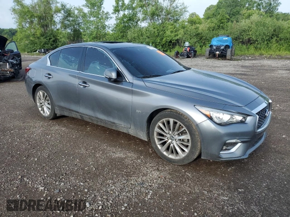 2020 Infiniti Q50 Luxe with VIN JN1EV7AR3LM254928, listed as a Copart auction lot 61452425 with 135,601 mi miles and Salvage title. Bid and sale history available at DreamBid. Image 4.