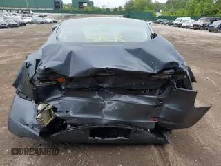 2023 Tesla Model 3 with VIN 5YJ3E1EA9PF673399, listed as a IAAI auction lot 42392643 with 7,571 mi miles and . Bid and sale history available at DreamBid. Image 17.