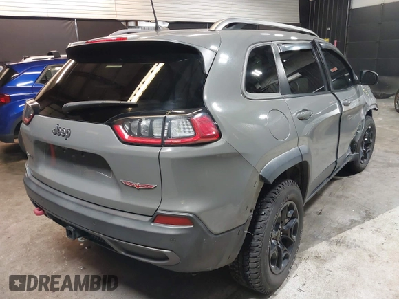 2019 Jeep Cherokee Trailhawk Elite with VIN 1C4PJMBX8KD458989, listed as a IAAI auction lot 41881517 with 89,045 mi miles. Bid and sale history available at carsss.com. Image 4.