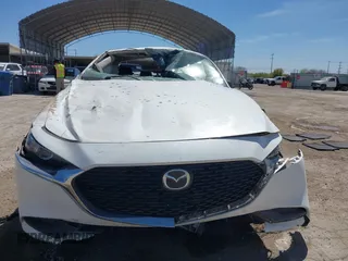 2021 Mazda 3 Select with VIN JM1BPABL0M1333705, listed as a IAAI auction lot 41819213 with 82,977 mi miles and . Bid and sale history available at DreamBid. Image 11.