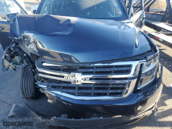 2019 Chevrolet Tahoe LS with VIN 1GNSCAKC1KR133160, listed as a Copart auction lot 88723515 with 77,214 mi miles and Salvage Title. Bid and sale history available at carsss.com. Image 12.