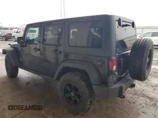 2014 Jeep Wrangler Unlimited Sport with VIN 1C4BJWDG2EL319714, listed as a Copart auction lot 47924575 with 129,294 mi miles and Salvage Title. Bid and sale history available at DreamBid. Image 2.