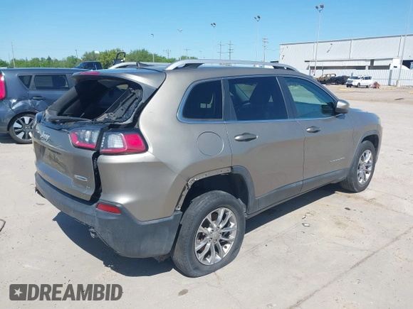 2019 Jeep Cherokee Latitude Plus with VIN 1C4PJMLBXKD233749, listed as a IAAI auction lot 41937698 with 103,988 mi miles and . Bid and sale history available at DreamBid. Image 4.