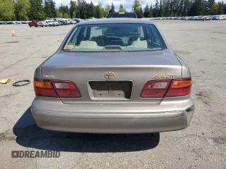 1998 Toyota Avalon XL with VIN 4T1BF18BXWU228989, listed as a Copart auction lot 53821495 with 157,209 mi miles and Salvage Title. Bid and sale history available at DreamBid. Image 6.
