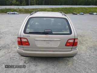 1999 Mercedes-Benz E-Class with VIN WDBJH65F9XA880146, listed as a Copart auction lot 72306164 with 192,442 mi miles and Salvage Title. Bid and sale history available at carsss.com. Image 6.