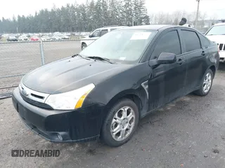 2008 Ford Focus SE with VIN 1FAHP35N08W105379, listed as a IAAI auction lot 41424575 with 210,985 mi miles. Bid and sale history available at carsss.com. Image 2.