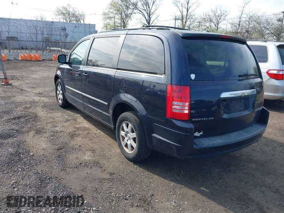 2010 Chrysler Town & Country Touring Plus with VIN 2A4RR8D1XAR480600, listed as a IAAI auction lot 42074257 with 195,154 mi miles and . Bid and sale history available at DreamBid. Image 3.