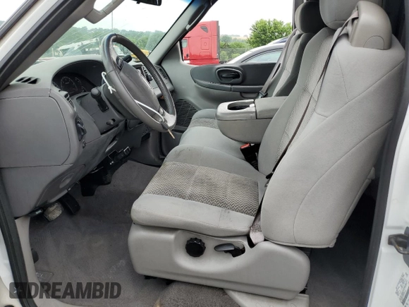 2003 Ford F-150 XL with VIN 1FTRX18L33NA43522, listed as a Copart auction lot 61197615 with 101,061 mi miles and Salvage title. Bid and sale history available at DreamBid. Image 7.