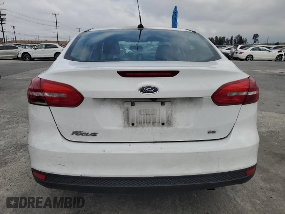 2017 Ford Focus SE with VIN 1FADP3F27HL217567, listed as a Copart auction lot 53749175 with 62,727 mi miles and Salvage title. Bid and sale history available at DreamBid. Image 6.
