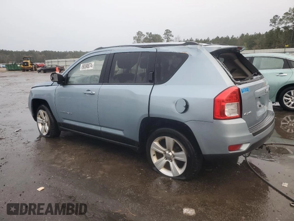 2013 Jeep Compass Latitude with VIN 1C4NJDEB8DD189709, listed as a Copart auction lot 86598874 with 170,041 mi miles and Salvage Title. Bid and sale history available at carsss.com. Image 2.