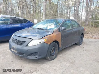 2010 Toyota Corolla with VIN 2T1BU4EE0AC521946, listed as a IAAI auction lot 42049301 with 169,807 mi miles. Bid and sale history available at carsss.com. Image 2.