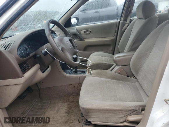 1997 Nissan Altima XE with VIN 1N4BU31D4VC232757, listed as a Copart auction lot 79102784 with 211,466 mi miles and Salvage Title. Bid and sale history available at carsss.com. Image 7.