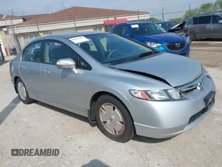 2006 Honda Civic z VIN JHMFA36216S029794, wystawiony jako IAAI lot #42449367 z przebiegiem 112 130 mil mil oraz . Historia ofert i sprzedaży dostępna na DreamBid. Obrazek 1.