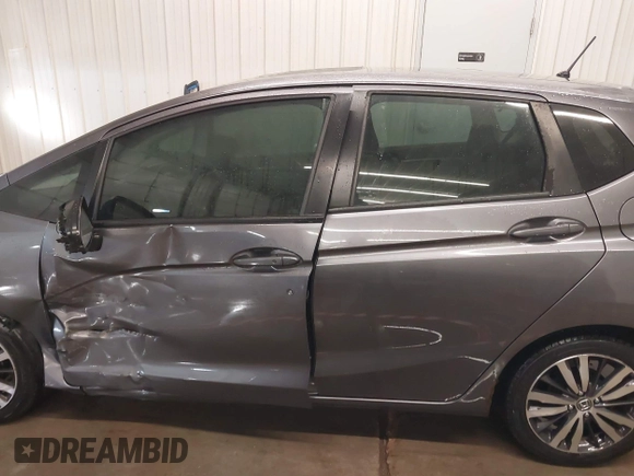 2015 Honda Fit EX-L with VIN 3HGGK5H85FM755006, listed as a IAAI auction lot 41034606 with 97,294 mi miles and . Bid and sale history available at DreamBid. Image 14.