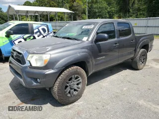 2013 Toyota Tacoma with VIN 3TMLU4EN1DM129865, listed as a Copart auction lot 60783185 with 218,457 mi miles and Clean title. Bid and sale history available at DreamBid. Image 1.